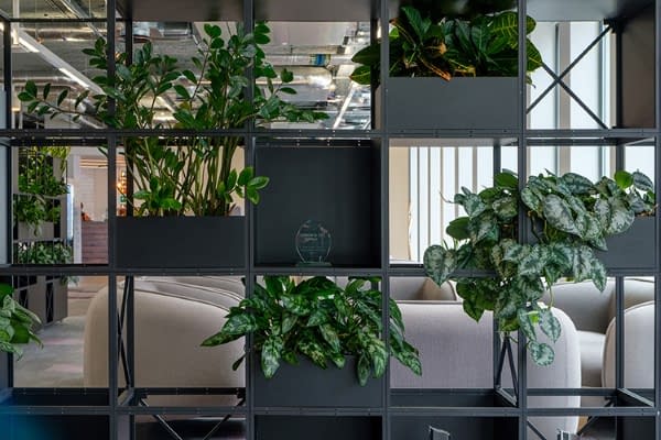 grid room divider with plants